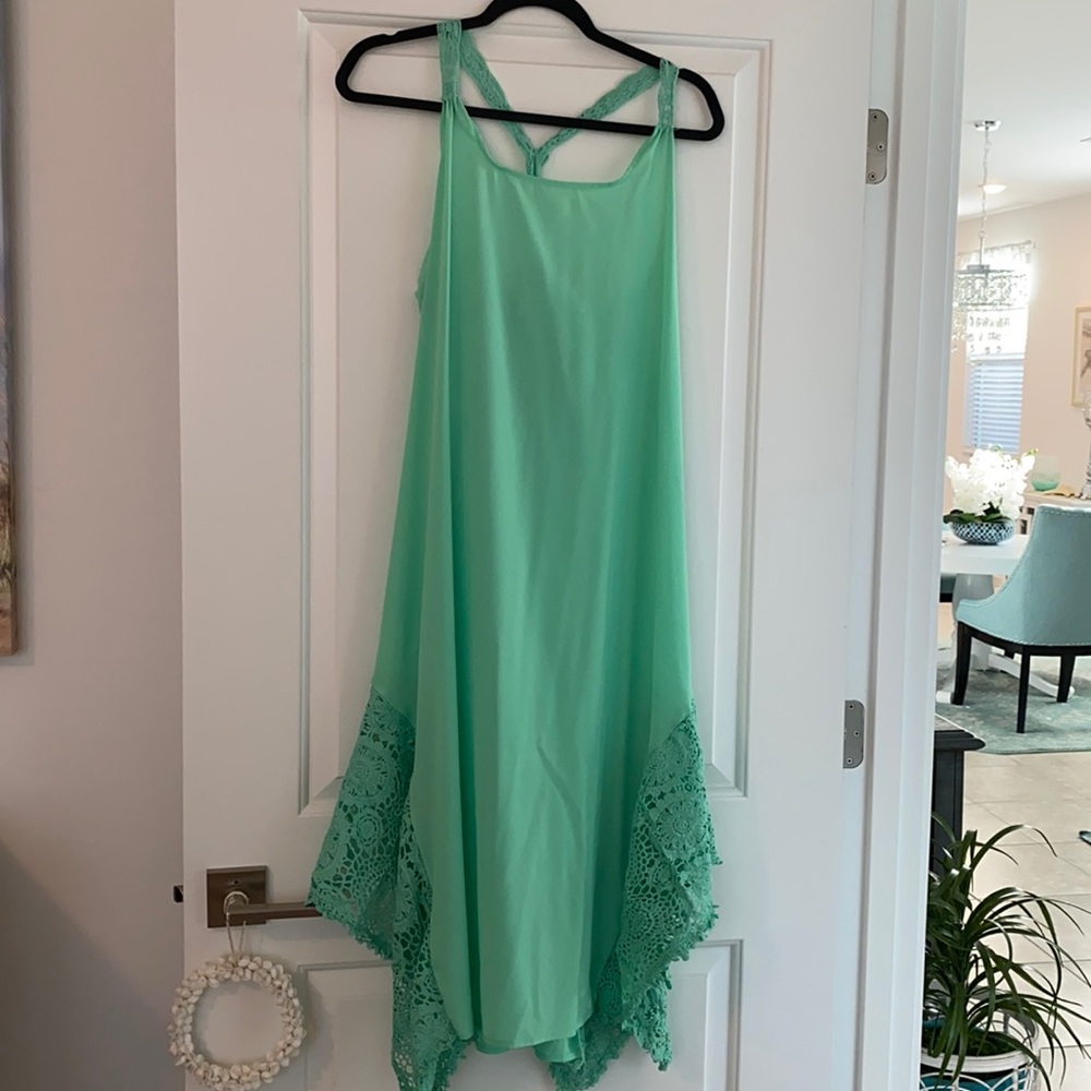 Mint green dress with lace strap detail